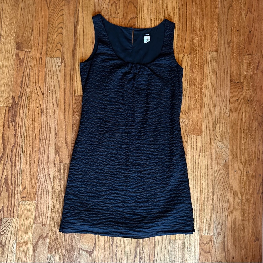 J. Crew sleeveless black dress with covered button closure on back. 100% cotton